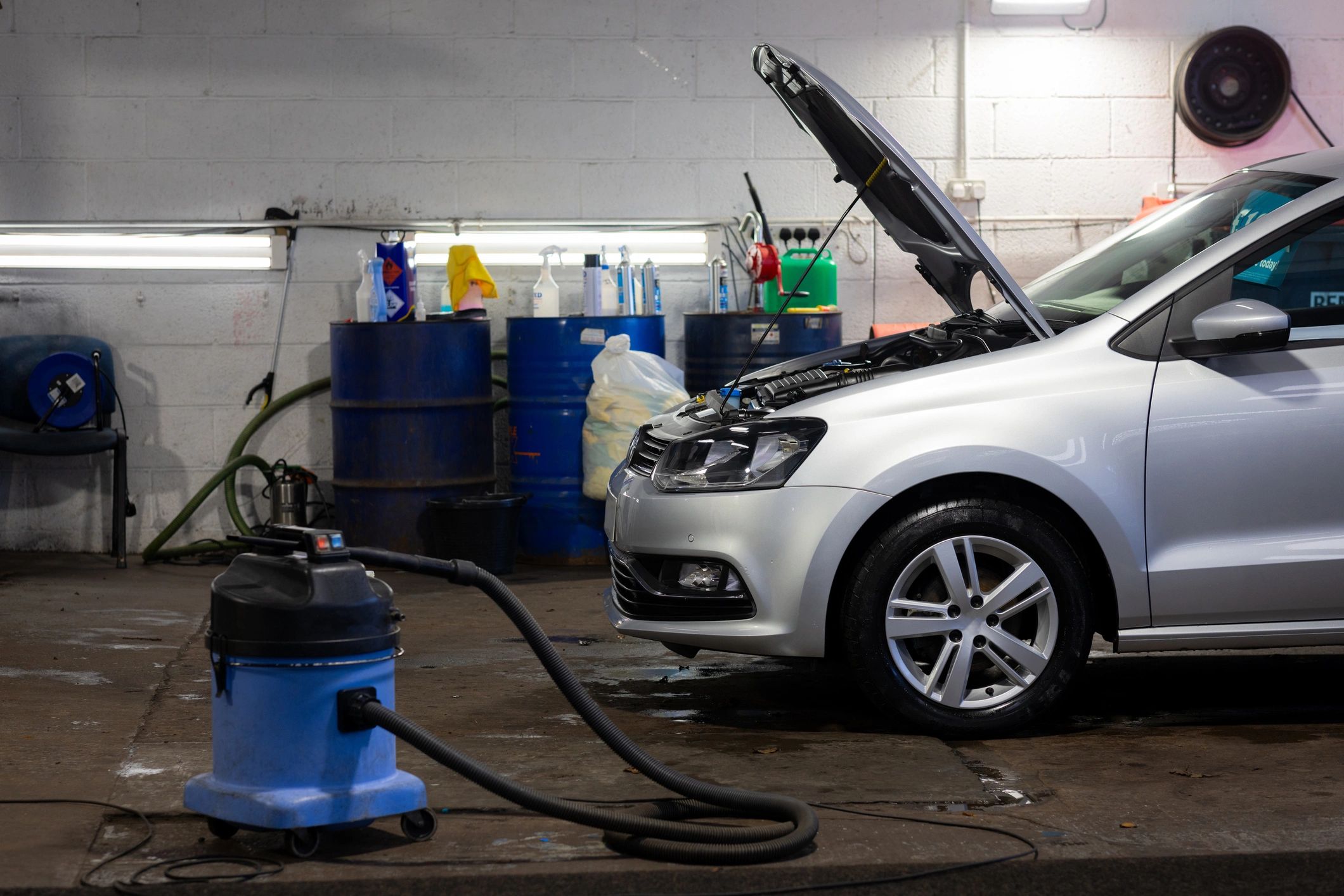 Vehicle in garage for dent and scratch repair