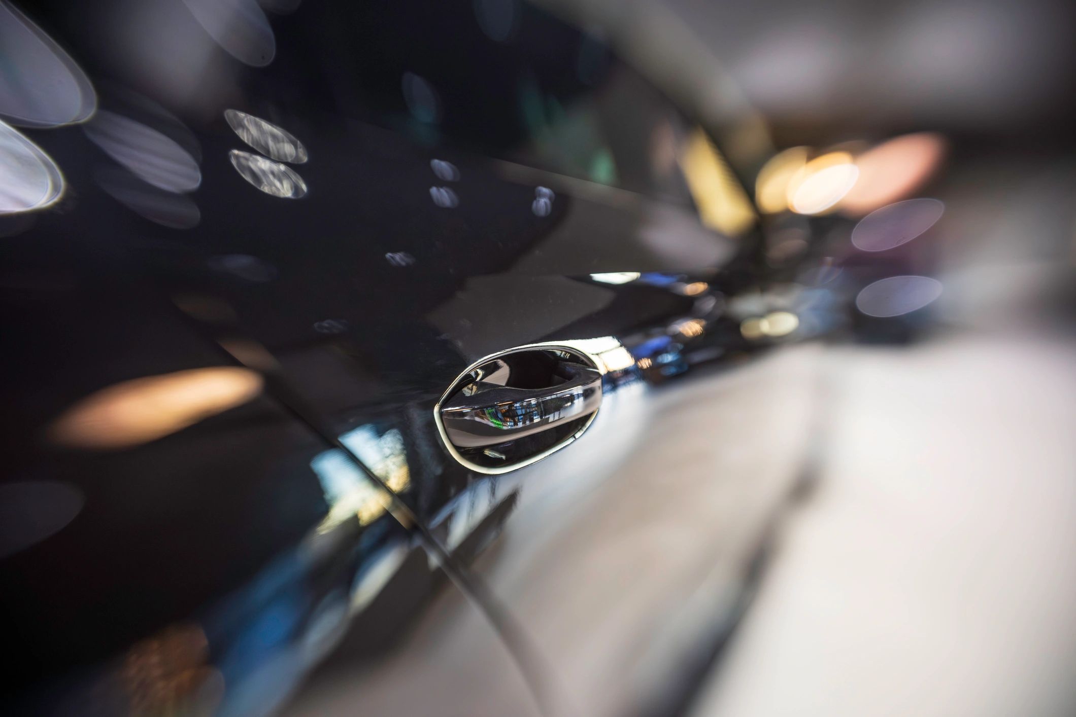 Black car exterior detail with polished finish
